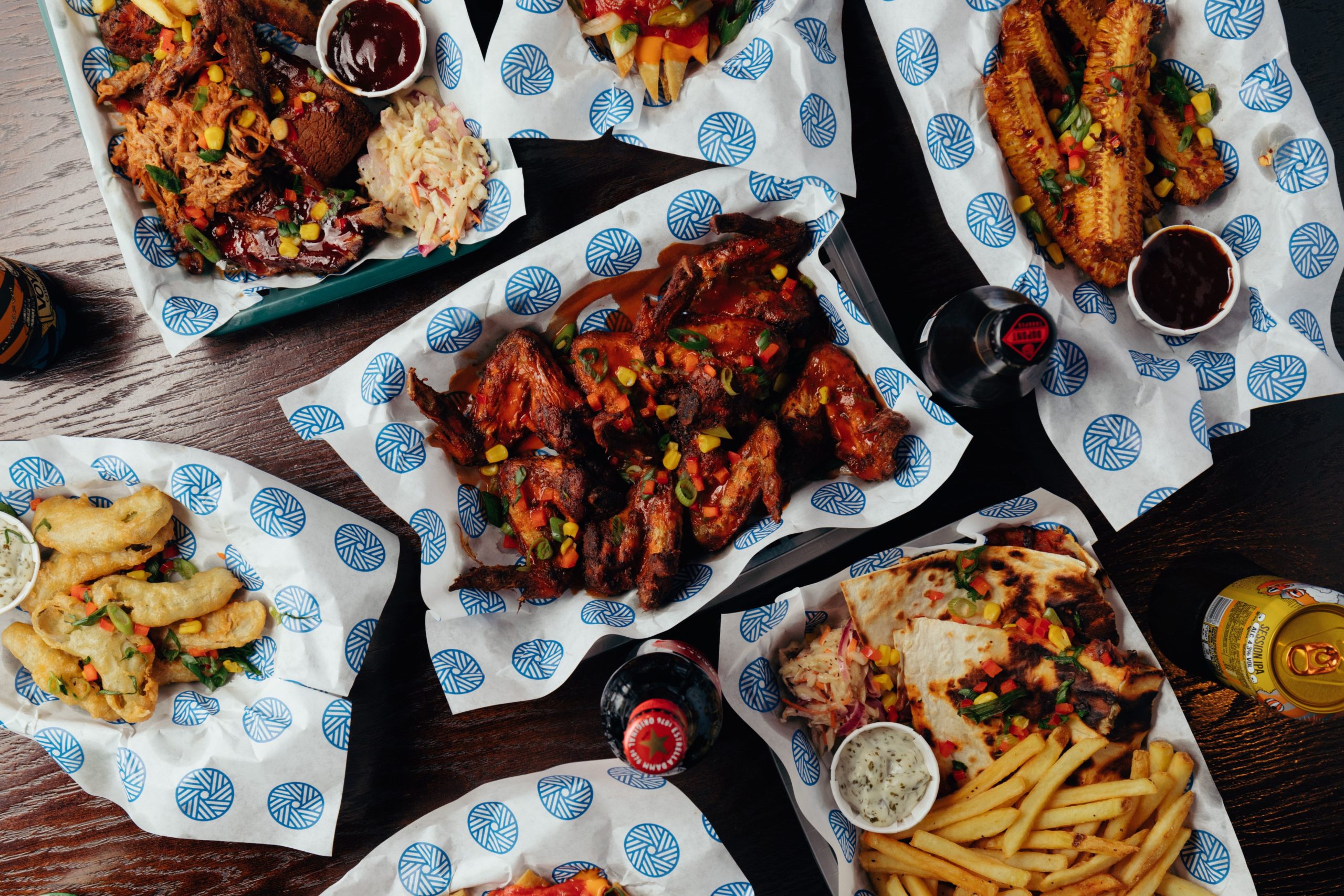 Grilled corn, chicken wings, fries and quesadillas served from the kitchen at The Old Grindstone